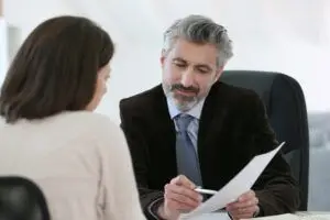 Attorney meeting client in office